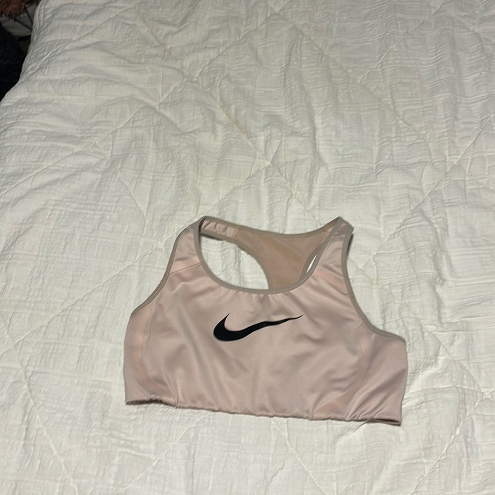Women’s pink Nike sports bra